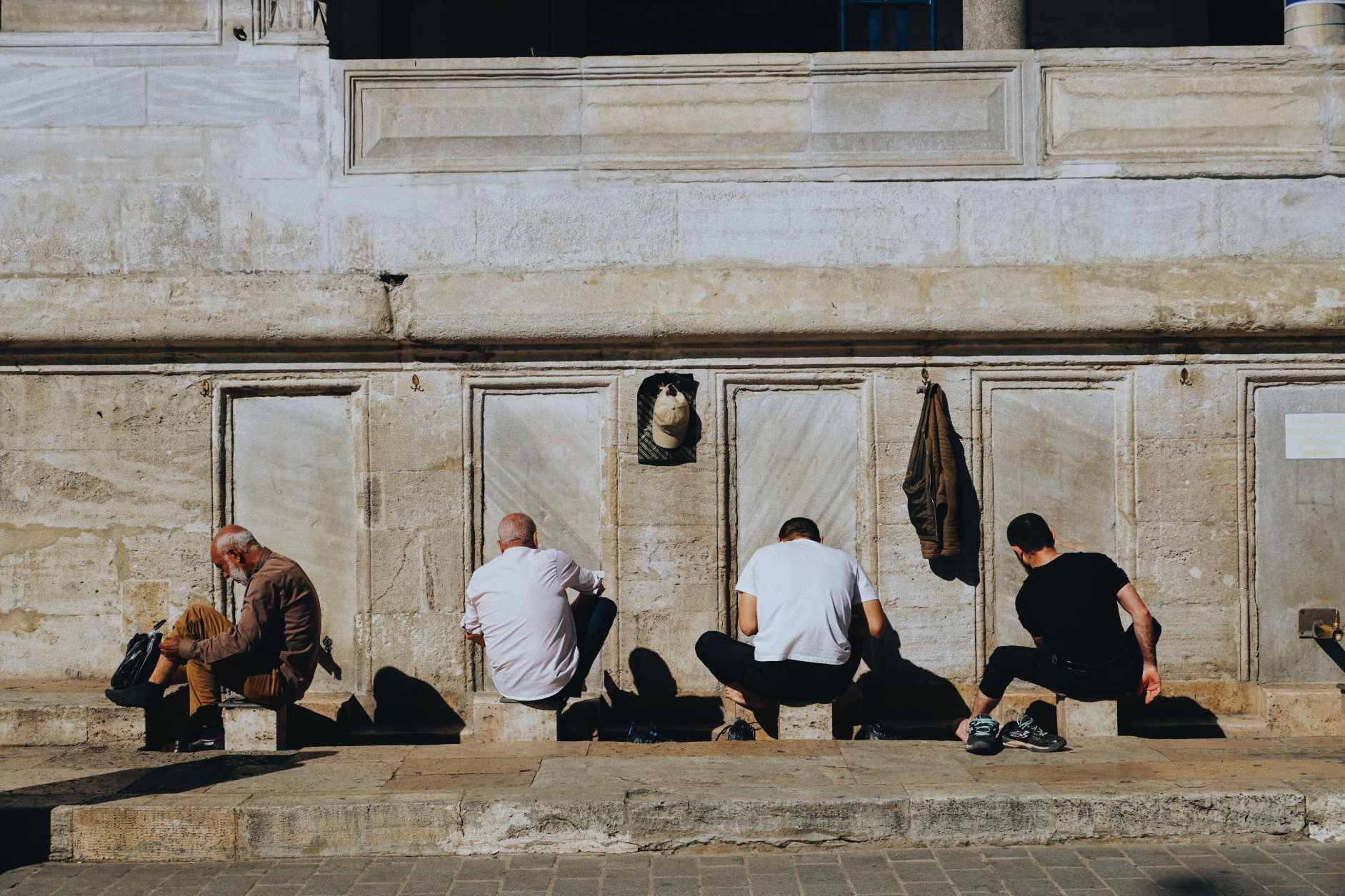Step by step guide showing how to perform wudu in Shia Islam